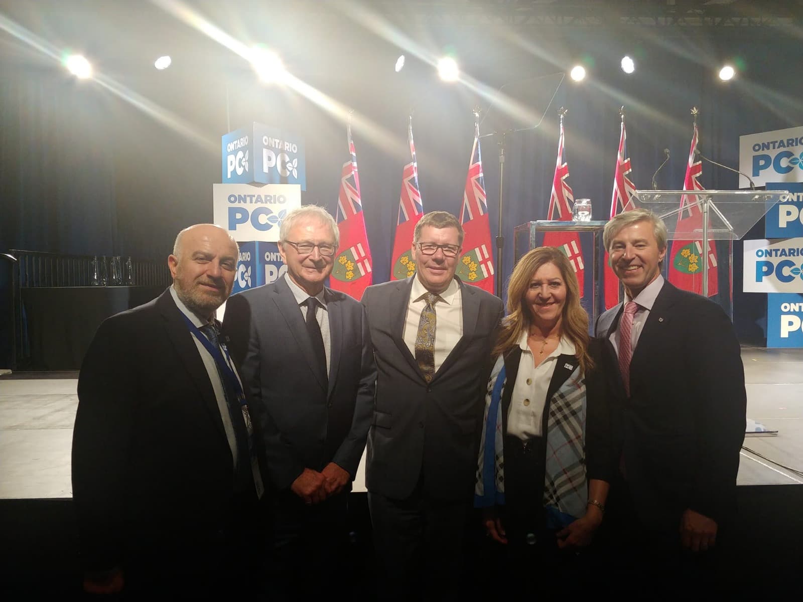 Serge Khatchadourian with colleagues on stage at an Ontario PC event