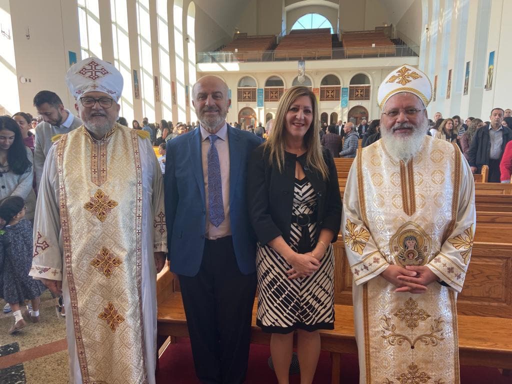 Serge Khatchadourian with clergy and a guest at a community church service