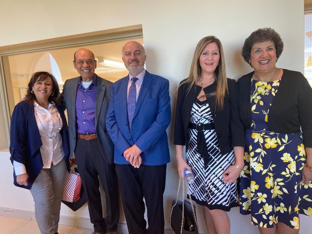 Serge Khatchadourian with community members at a local gathering