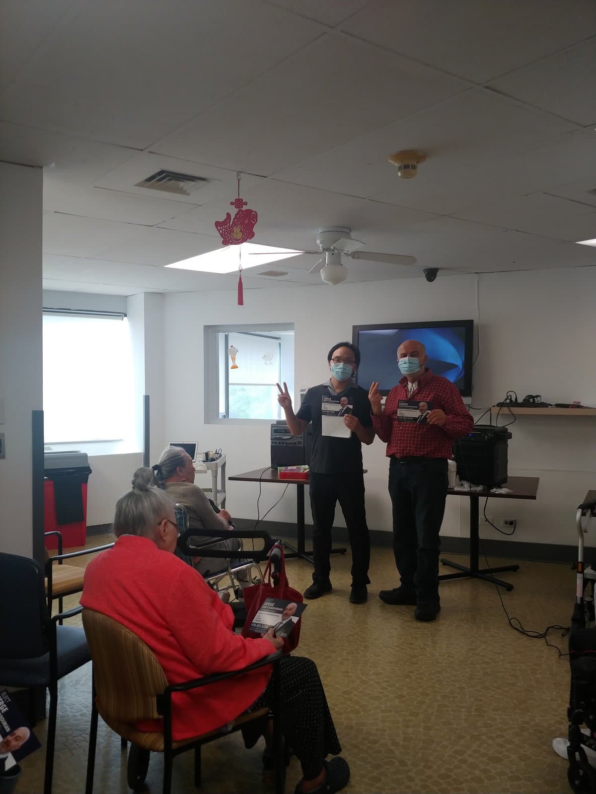 Serge Khatchadourian meeting residents at a seniors' residence