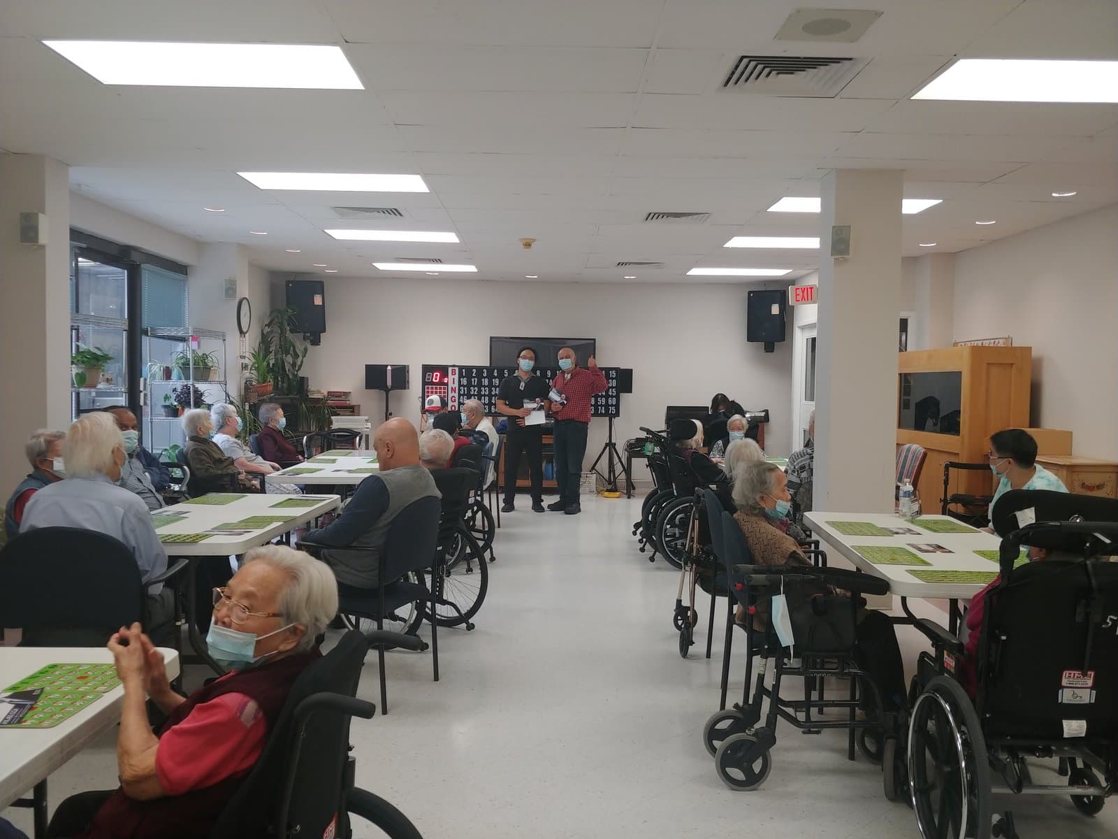 Serge Khatchadourian visiting residents during an afternoon activity at a seniors' residence