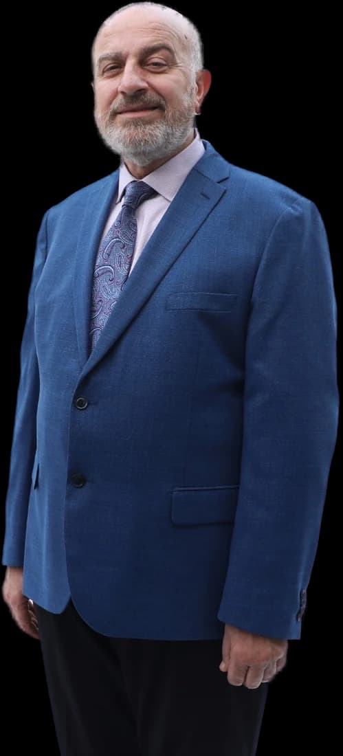 Cut-out full-length portrait of Serge Khatchadourian in a blue suit