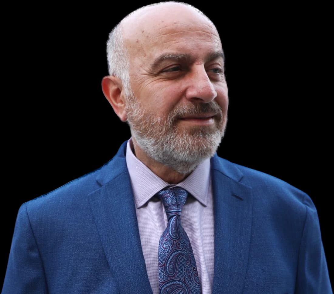 Cut-out portrait of Serge Khatchadourian looking to the side